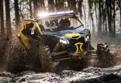 Yellow UTV in mud